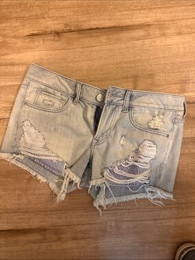 Express Light Blue Distressed Denim Shorts with Striped Underlay